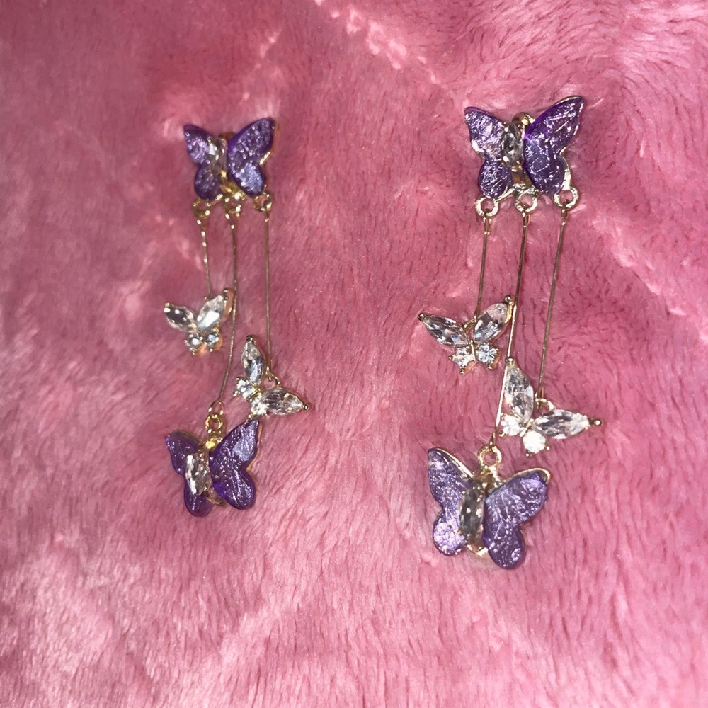 Purple butterfly dangly earrings